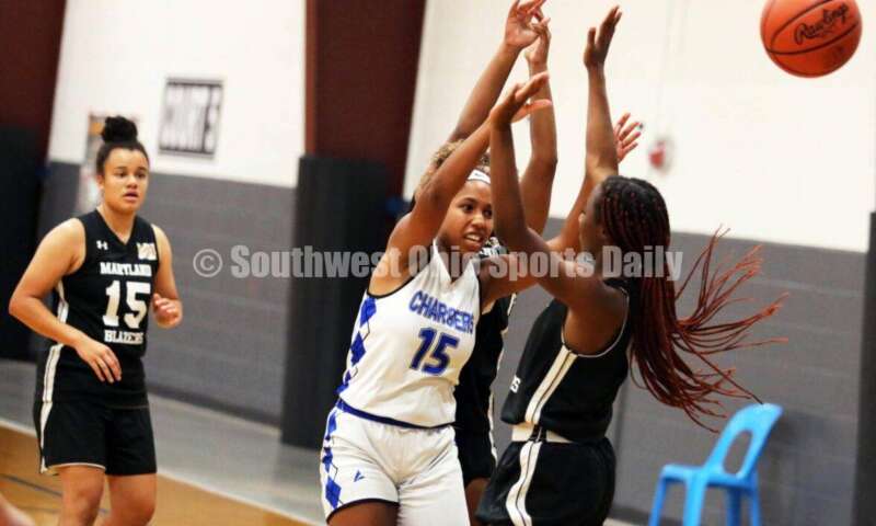 Edgewood High School's Lexi Livingston (15) makes a pressured pass July 10, 2021, during the Cincy Chargers' game against the Maryland Blazers in a matchup of 17-year-old girls basketball teams in the USJN's Midwest Summer Challenge at Sports Plus in Evendale. The Chargers won 58-31. RICK CASSANO/STAFF