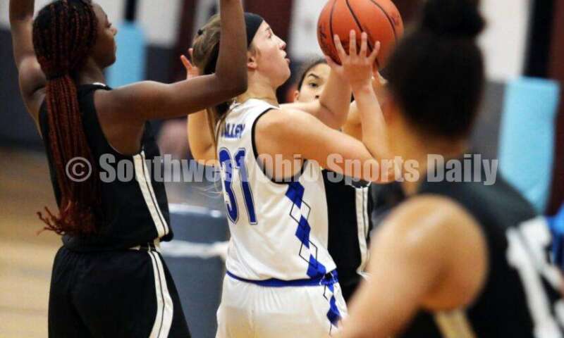 Ross High School's Veronica Allen handles the ball in traffic July 10, 2021, during the Cincy Chargers' game against the Maryland Blazers in a matchup of 17-year-old girls basketball teams in the USJN's Midwest Summer Challenge at Sports Plus in Evendale. The Chargers won 58-31. RICK CASSANO/STAFF