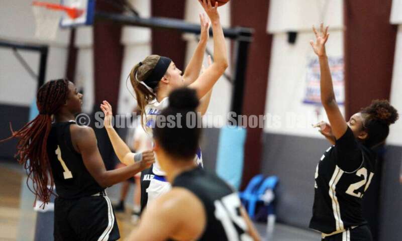 Ross High School's Veronica Allen puts up a shot in traffic July 10, 2021, during the Cincy Chargers' game against the Maryland Blazers in a matchup of 17-year-old girls basketball teams in the USJN's Midwest Summer Challenge at Sports Plus in Evendale. The Chargers won 58-31. RICK CASSANO/STAFF