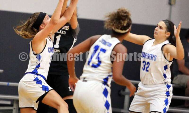 Ross High School's Veronica Allen fights for the ball as Edgewood's Lexi Livingston (15) and Lakota West's Emily Doerman (32) watch July 10, 2021, during the Cincy Chargers' game against the Maryland Blazers in a matchup of 17-year-old girls basketball teams in the USJN's Midwest Summer Challenge at Sports Plus in Evendale. The Chargers won 58-31. RICK CASSANO/STAFF