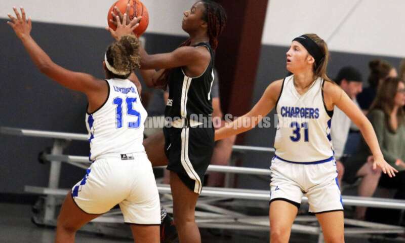 Edgewood High School's Lexi Livingston (15) and Ross' Veronica Allen (31) put in some defensive work July 10, 2021, during the Cincy Chargers' game against the Maryland Blazers in a matchup of 17-year-old girls basketball teams in the USJN's Midwest Summer Challenge at Sports Plus in Evendale. The Chargers won 58-31. RICK CASSANO/STAFF