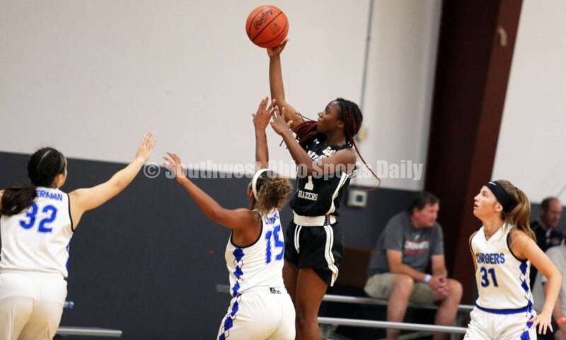 Edgewood High School's Lexi Livingston (15), Lakota West's Emiily Doerman (32) and Ross' Veronica Allen (31) work on defense July 10, 2021, during the Cincy Chargers' game against the Maryland Blazers in a matchup of 17-year-old girls basketball teams in the USJN's Midwest Summer Challenge at Sports Plus in Evendale. The Chargers won 58-31. RICK CASSANO/STAFF