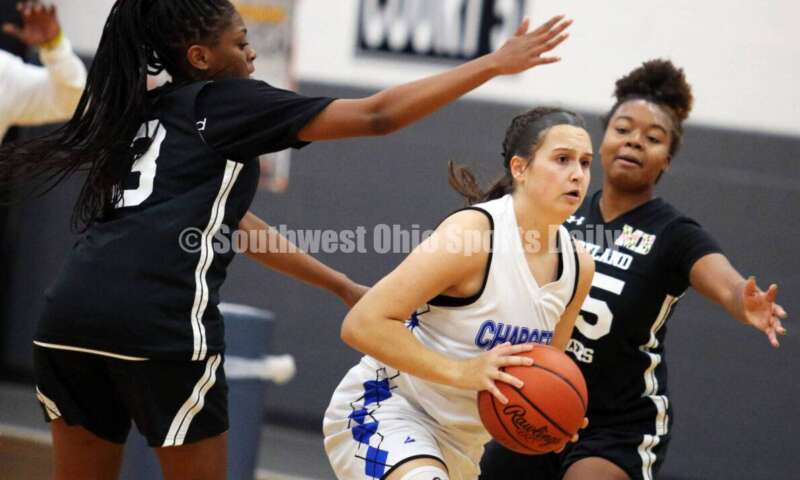 Lakota West High School's Emily Doerman prepares to make a pass July 10, 2021, during the Cincy Chargers' game against the Maryland Blazers in a matchup of 17-year-old girls basketball teams in the USJN's Midwest Summer Challenge at Sports Plus in Evendale. The Chargers won 58-31. RICK CASSANO/STAFF