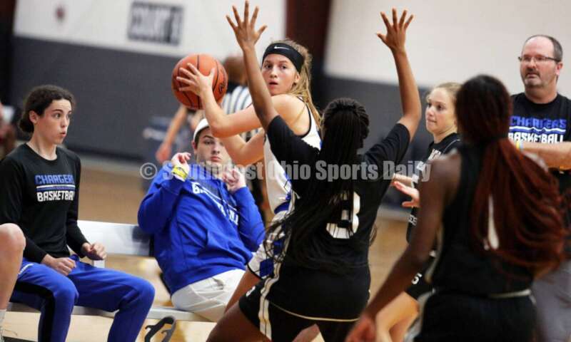 Ross High School's Veronica Allen looks for an open teammate July 10, 2021, during the Cincy Chargers' game against the Maryland Blazers in a matchup of 17-year-old girls basketball teams in the USJN's Midwest Summer Challenge at Sports Plus in Evendale. The Chargers won 58-31. RICK CASSANO/STAFF