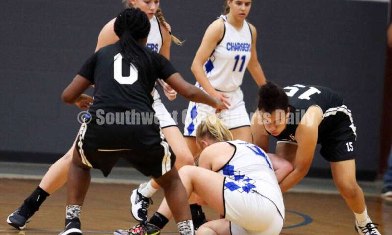 Edgewood High School's Jessica Moore (4) battles for the ball July 10, 2021, during the Cincy Chargers' game against the Maryland Blazers in a matchup of 17-year-old girls basketball teams in the USJN's Midwest Summer Challenge at Sports Plus in Evendale. The Chargers won 58-31. RICK CASSANO/STAFF