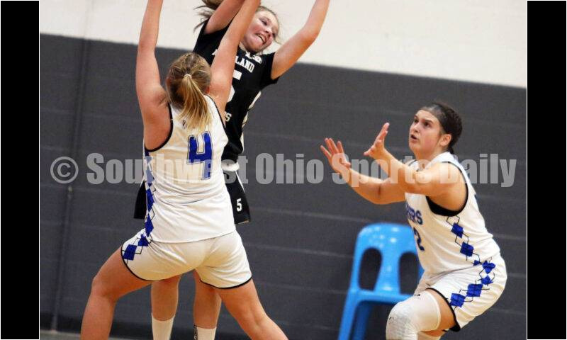 Edgewood High School's Jessica Moore (4) and Lakota West's Emily Doerman (right) apply defensive pressure July 10, 2021, during the Cincy Chargers' game against the Maryland Blazers in a matchup of 17-year-old girls basketball teams in the USJN's Midwest Summer Challenge at Sports Plus in Evendale. The Chargers won 58-31. RICK CASSANO/STAFF