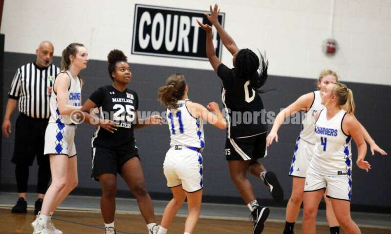 Edgewood High School's Jessica Moore (4) and Lebanon's Keira Rogers (11) are among the defenders July 10, 2021, during the Cincy Chargers' game against the Maryland Blazers in a matchup of 17-year-old girls basketball teams in the USJN's Midwest Summer Challenge at Sports Plus in Evendale. The Chargers won 58-31. RICK CASSANO/STAFF
