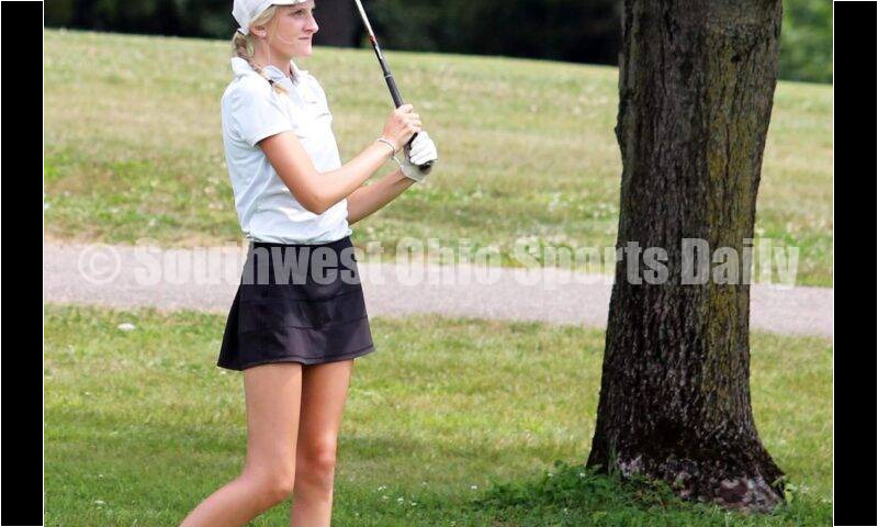 Fenwick High School's Kaitlyn Hemmelgarn watches her shot Aug. 6, 2021, during a Greater Catholic League Coed Division girls golf match against Dayton Carroll at Brown's Run Country Club. Fenwick won 172-188. RICK CASSANO/STAFF