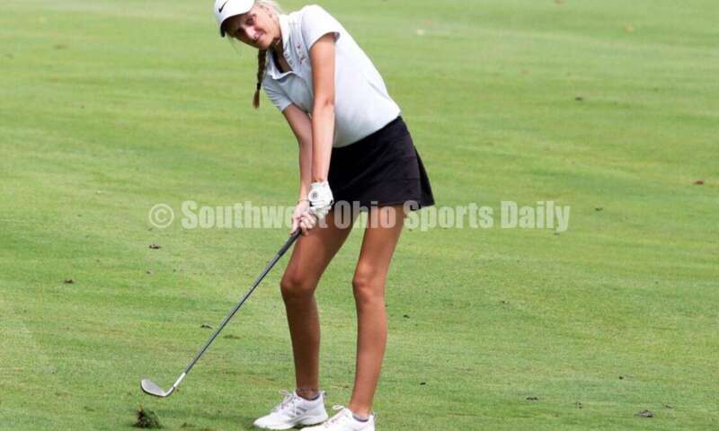 Fenwick High School's Kaitlyn Hemmelgarn hits the ball toward the green Aug. 6, 2021, during a Greater Catholic League Coed Division girls golf match against Dayton Carroll at Brown's Run Country Club. Fenwick won 172-188. RICK CASSANO/STAFF