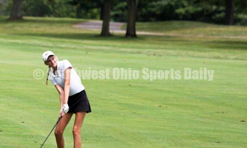 Fenwick High School's Kaitlyn Hemmelgarn sends the ball toward the green Aug. 6, 2021, during a Greater Catholic League Coed Division girls golf match against Dayton Carroll at Brown's Run Country Club. Fenwick won 172-188. RICK CASSANO/STAFF