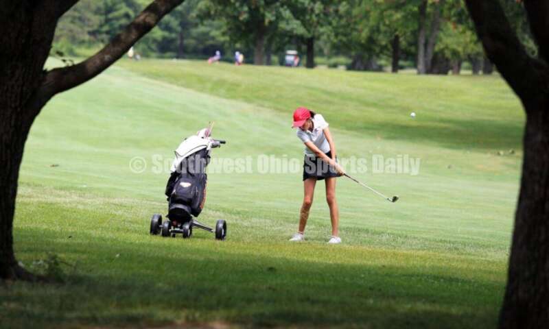 Fenwick High School's Sophie Rush follows through on a shot Aug. 6, 2021, during a Greater Catholic League Coed Division girls golf match against Dayton Carroll at Brown's Run Country Club. Fenwick won 172-188. RICK CASSANO/STAFF