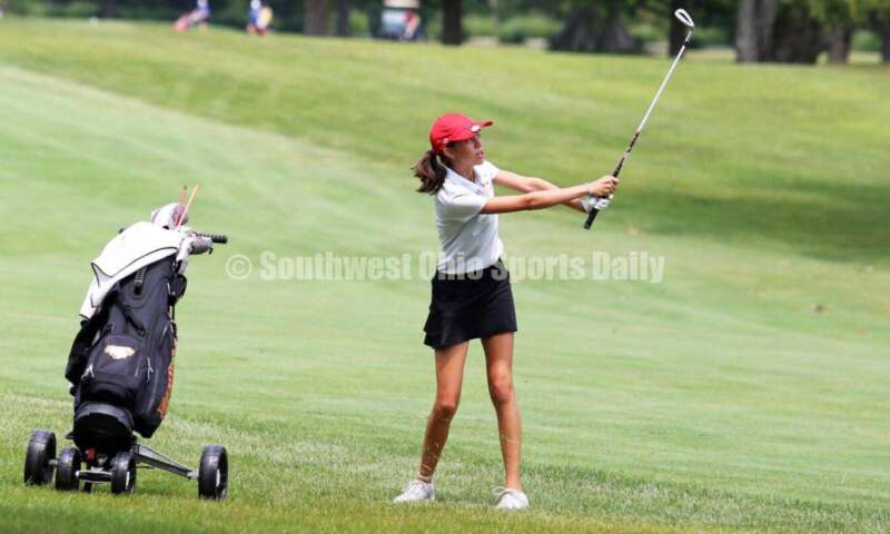 Fenwick High School's Sophie Rush follows through on a shot Aug. 6, 2021, during a Greater Catholic League Coed Division girls golf match against Dayton Carroll at Brown's Run Country Club. Fenwick won 172-188. RICK CASSANO/STAFF