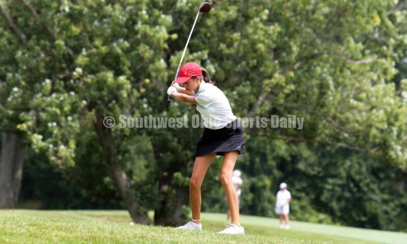 Fenwick High School's Sophie Rush tees off Aug. 6, 2021, during a Greater Catholic League Coed Division girls golf match against Dayton Carroll at Brown's Run Country Club. Fenwick won 172-188. RICK CASSANO/STAFF