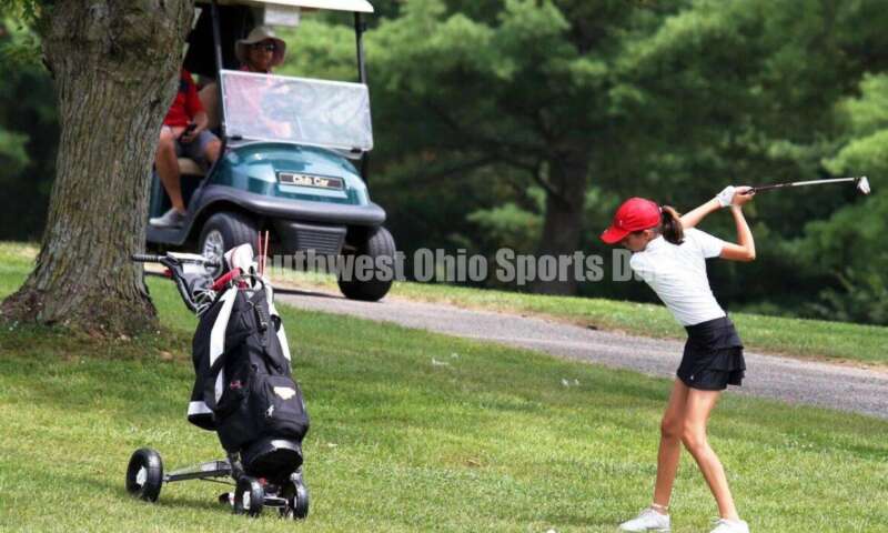 Fenwick High School's Sophie Rush winds up for a swing Aug. 6, 2021, during a Greater Catholic League Coed Division girls golf match against Dayton Carroll at Brown's Run Country Club. Fenwick won 172-188. RICK CASSANO/STAFF
