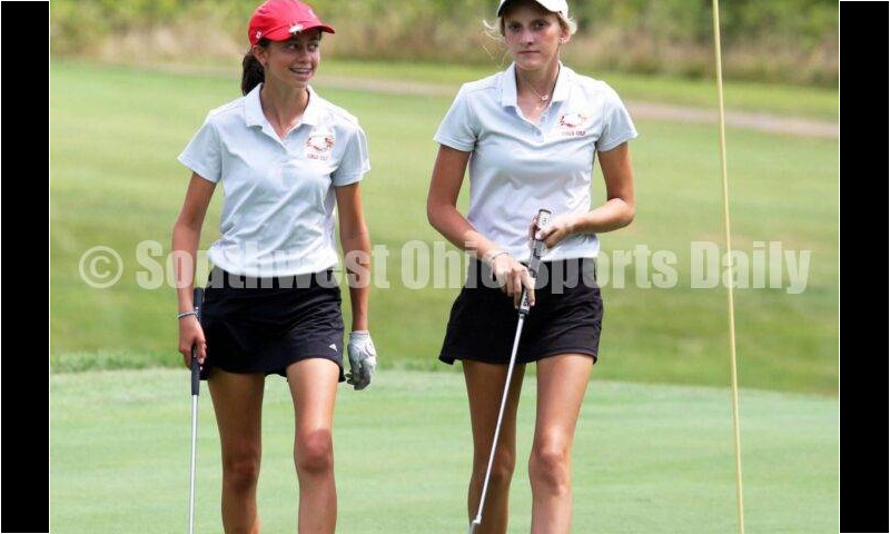 Fenwick High School's Kaitlyn Hemmelgarn (right) and Sophie Rush walk off the green Aug. 6, 2021, during a Greater Catholic League Coed Division girls golf match against Dayton Carroll at Brown's Run Country Club. Fenwick won 172-188. RICK CASSANO/STAFF