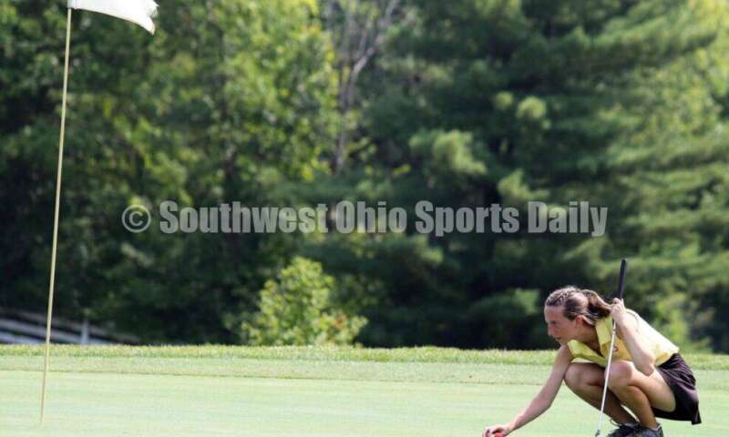 Fenwick High School's Amelia Snyder lines up a putt Aug. 6, 2021, during a Greater Catholic League Coed Division girls golf match against Dayton Carroll at Brown's Run Country Club. Fenwick won 172-188. RICK CASSANO/STAFF