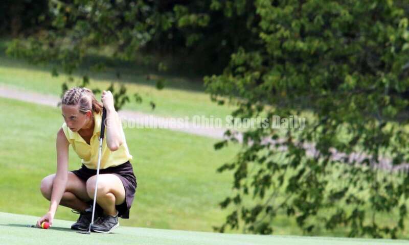 Fenwick High School's Amelia Snyder lines up a putt Aug. 6, 2021, during a Greater Catholic League Coed Division girls golf match against Dayton Carroll at Brown's Run Country Club. Fenwick won 172-188. RICK CASSANO/STAFF
