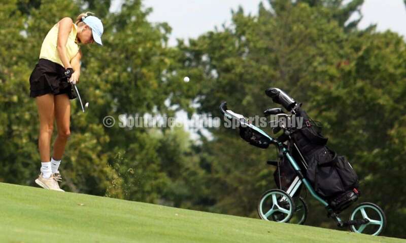 Fenwick's Jocelyn Wright follows through on a shot Aug. 6, 2021, during a Greater Catholic League Coed Division girls golf match against Dayton Carroll at Brown's Run Country Club. Fenwick won 172-188. RICK CASSANO/STAFF