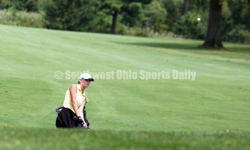 Fenwick High School's Jocelyn Wright watches her shot Aug. 6, 2021, during a Greater Catholic League Coed Division girls golf match against Dayton Carroll at Brown's Run Country Club. Fenwick won 172-188. RICK CASSANO/STAFF