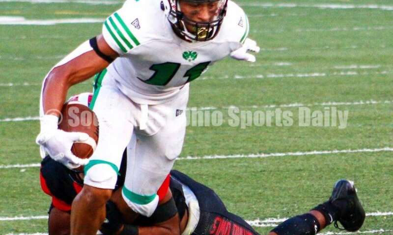 Badin High School's Braedyn Moore breaks a tackle Aug. 20, 2021, during a nonleague football game at Mount Healthy. Badin won 27-7. CONTRIBUTED PHOTO BY JON SEPCHINSKI