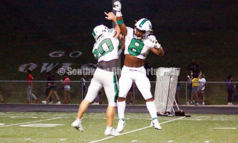 Badin High School's Jack Walsh (20) and Jeffrey Luna-Mata (8) celebrates the Rams' 27-7 nonleague football win at Mount Healthy on Aug. 20, 2021. CONTRIBUTED PHOTO BY JON SEPCHINSKI