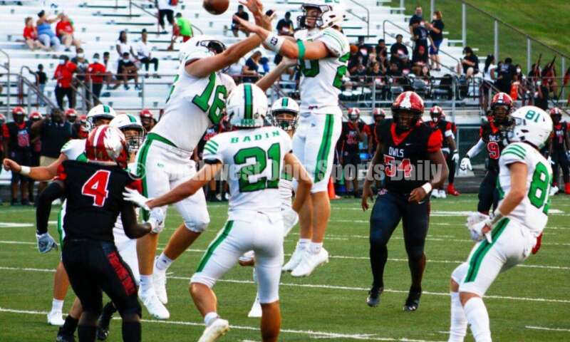 Badin High School's Reese Anzalone (16) and Jack Walsh (20) go up for a pass Aug. 20, 2021, during a nonleague football game at Mount Healthy. Badin won 27-7. CONTRIBUTED PHOTO BY JON SEPCHINSKI