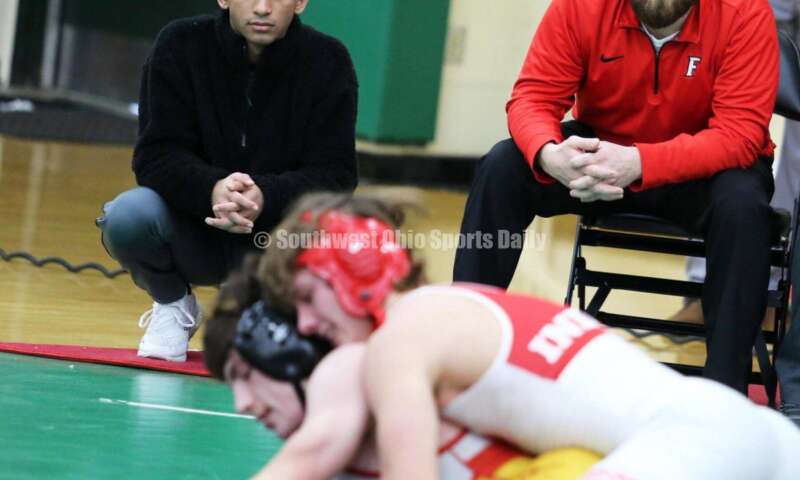 Fairfield High School coach Blair Willcocks watches Tannar Beermann's 144-pound match with Brecksville's Manny Scordos on Dec. 19, 2021, during the Southwest Ohio Wrestling Coaches Association Coaches Classic at Harrison High School. RICK CASSANO/STAFF