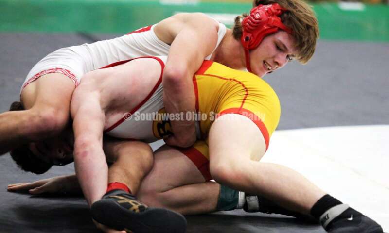 Fairfield High School's Tannar Beermann (top) grabs Brecksville's Manny Scordos in a 144-pound match Dec. 19, 2021, during the Southwest Ohio Wrestling Coaches Association Coaches Classic at Harrison High School. RICK CASSANO/STAFF