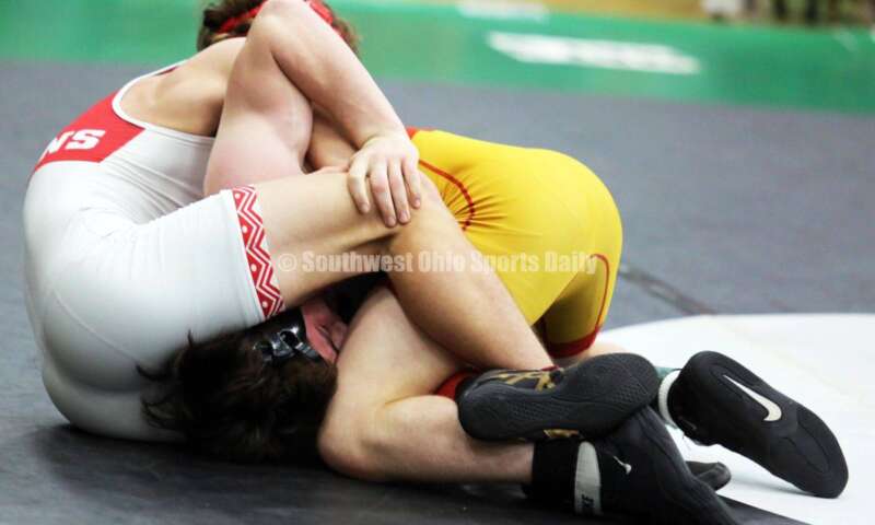 Fairfield High School's Tannar Beermann (left) competes with Brecksville's Manny Scordos in a 144-pound match Dec. 19, 2021, during the Southwest Ohio Wrestling Coaches Association Coaches Classic at Harrison High School. RICK CASSANO/STAFF