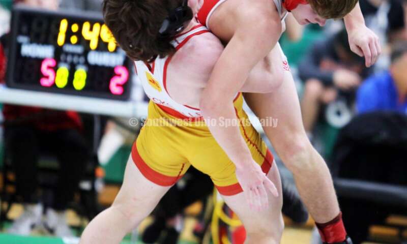 Brecksville High School's Manny Scordos grabs Fairfield's Tanner Beermann in a 144-pound match Dec. 19, 2021, during the Southwest Ohio Wrestling Coaches Association Coaches Classic at Harrison High School. RICK CASSANO/STAFF