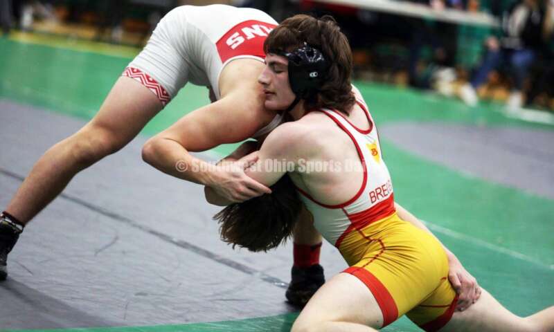 Fairfield High School's Tannar Beermann (left) and Brecksville's Manny Scordos battle in a 144-pound match Dec. 19, 2021, during the Southwest Ohio Wrestling Coaches Association Coaches Classic at Harrison High School. RICK CASSANO/STAFF