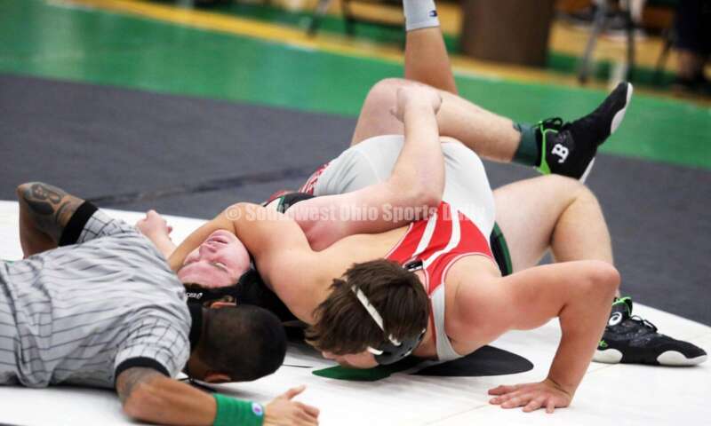 Brecksville High School's Max Vanadia controls Badin's Ely Emmons in the 215-pound championship match Dec. 19, 2021, during the Southwest Ohio Wrestling Coaches Association Coaches Classic at Harrison High School. RICK CASSANO/STAFF