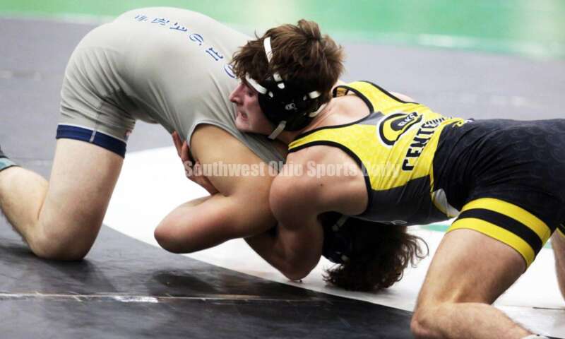 Centerville High School's Aydan George (right) is on top of Edgewood's Aiden Rader in a 165-pound match Dec. 19, 2021, during the Southwest Ohio Wrestling Coaches Association Coaches Classic at Harrison High School. RICK CASSANO/STAFF