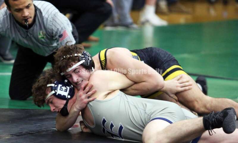Centerville High School's Aydan George is on top of Edgewood's Aiden Rader in a 165-pound match Dec. 19, 2021, during the Southwest Ohio Wrestling Coaches Association Coaches Classic at Harrison High School. RICK CASSANO/STAFF