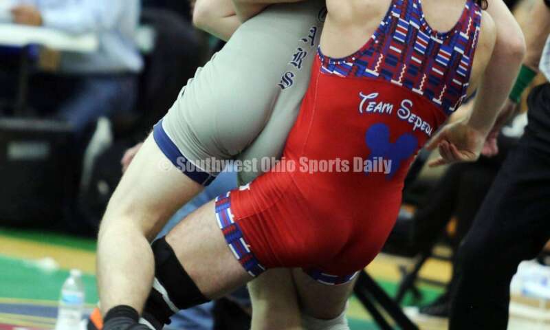 Marysville High School's Erryl Will has a grip on Edgewood's Aiden Rader in a 165-pound match Dec. 19, 2021, during the Southwest Ohio Wrestling Coaches Association Coaches Classic at Harrison High School. RICK CASSANO/STAFF