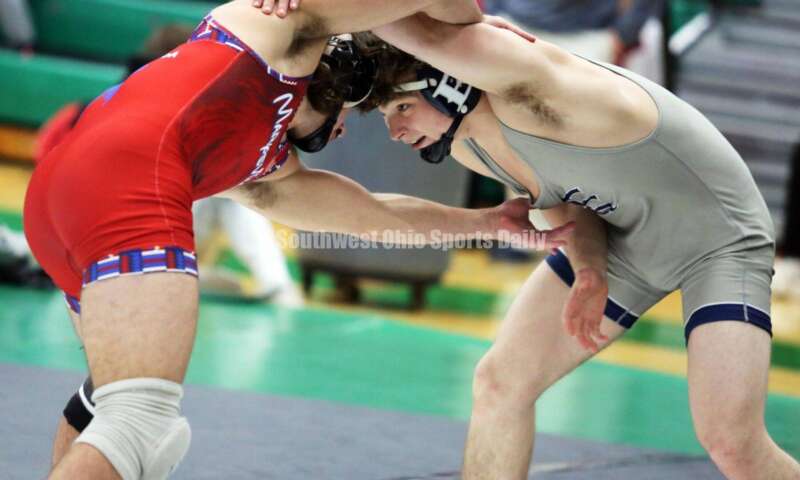 Edgewood High School's Aiden Rader (right) battles Marysville's Erryl Will in a 165-pound match Dec. 19, 2021, during the Southwest Ohio Wrestling Coaches Association Coaches Classic at Harrison High School. RICK CASSANO/STAFF