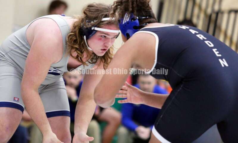 Edgewood High School's Radical Rothermel (left) squares off with Northwest's Makarrie Harden in a 285-pound match Dec. 19, 2021, during the Southwest Ohio Wrestling Coaches Association Coaches Classic at Harrison High School. RICK CASSANO/STAFF