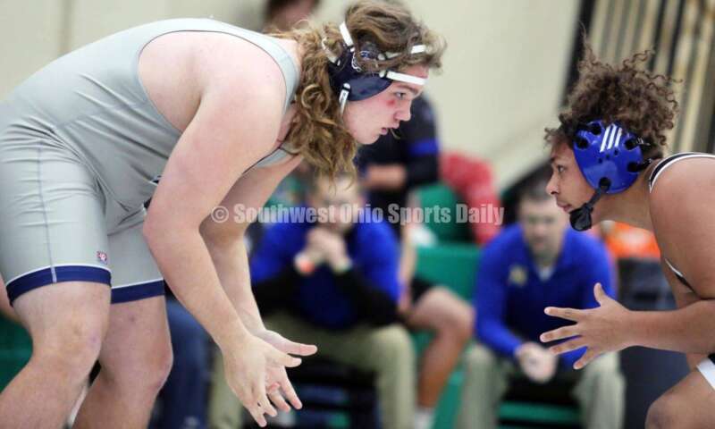 Edgewood High School's Radical Rothermel (left) squares off with Northwest's Makarrie Harden in a 285-pound match Dec. 19, 2021, during the Southwest Ohio Wrestling Coaches Association Coaches Classic at Harrison High School. RICK CASSANO/STAFF