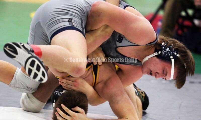 Edgewood High School's Wyatt Walker (top) controls Little Miami's Brentan Simmerman in a 215-pound match Dec. 19, 2021, during the Southwest Ohio Wrestling Coaches Association Coaches Classic at Harrison High School. RICK CASSANO/STAFF