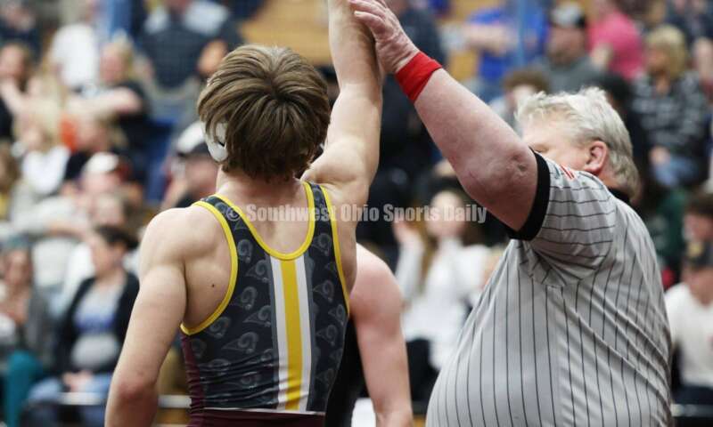 Ross High School's Ryan Foster defeats Wilmington's Carson Hibbs in the 132-pound third-place match at the Division II district wrestling tournament March 5, 2022, in Wilmington. RON ALVEY/CONTRIBUTOR