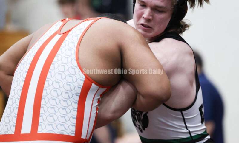 Badin High School's Ely Emmons (right) competes with London's Antonio Burns in the 215-pound third-place match at the Division II district wrestling tournament March 5, 2022, in Wilmington. RON ALVEY/CONTRIBUTOR