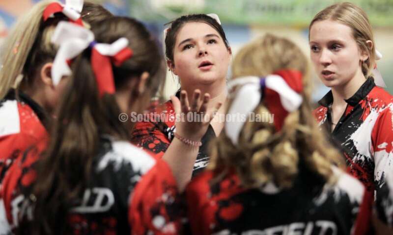 Fairfield High School's Vanessa Roese (center) talks with her teammates March 12, 2022, during the Division I state girls bowling tournament at Wayne Webb's Columbus Bowl. RICK CASSANO/STAFF