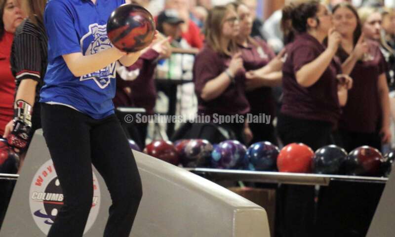 Hamilton High School's Allison Porter prepares to roll the ball March 12, 2022, during the Division I state girls bowling tournament at Wayne Webb's Columbus Bowl. RICK CASSANO/STAFF