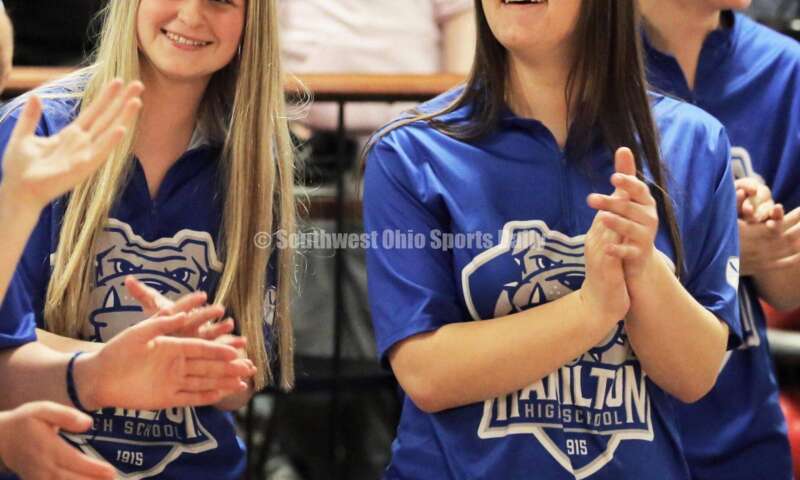 Hamilton High School's Kara Getz (left) and Madalyn Klapper enjoy the celebration March 12, 2022, after the Division I state girls bowling tournament at Wayne Webb's Columbus Bowl. RICK CASSANO/STAFF