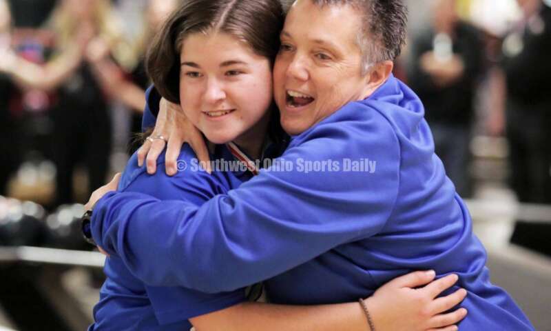 Hamilton High School athletic director Missy Harvey hugs Shelbie Deaton on March 12, 2022, after the Division I state girls bowling tournament at Wayne Webb's Columbus Bowl. RICK CASSANO/STAFF