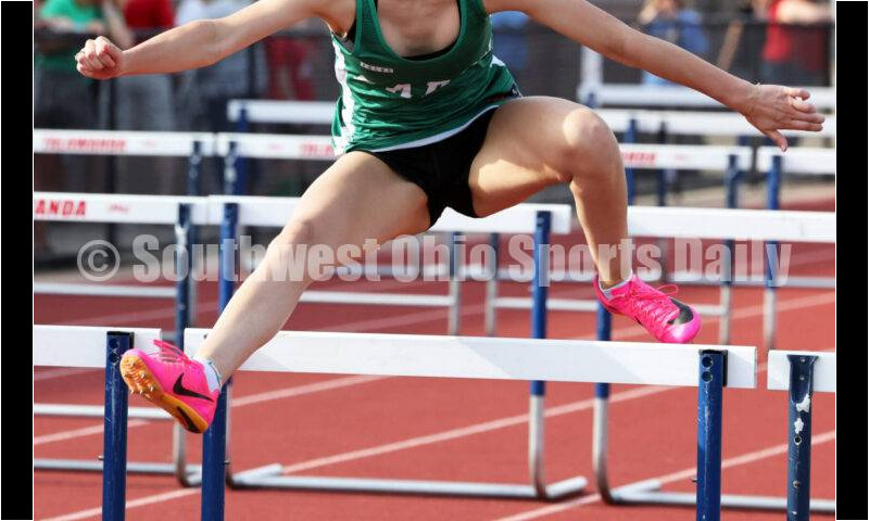 Badin High School's Allison Falk goes over a hurdle in the girls 100-meter hurdles April 16, 2024, during the Dale Plank Invitational track & field meet at Talawanda. RICK CASSANO/STAFF