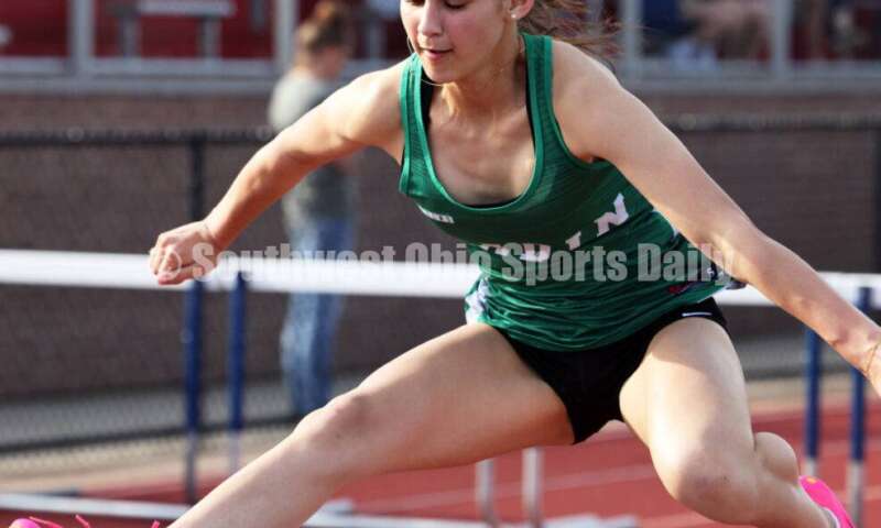 Badin High School's Allison Falk goes over a hurdle in the girls 100-meter hurdles April 16, 2024, during the Dale Plank Invitational track & field meet at Talawanda. RICK CASSANO/STAFF