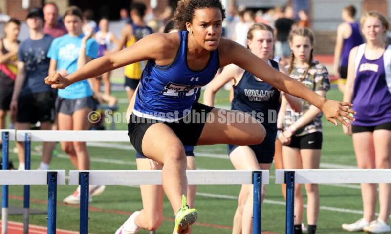 Hamilton High School's Makayla Platt clears a hurdle in the girls 100-meter hurdles April 16, 2024, during the Dale Plank Invitational track & field meet at Talawanda. RICK CASSANO/STAFF