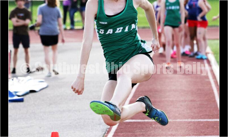Badin High School's Becca Moore flies through the air in the girls long jump April 16, 2024, during the Dale Plank Invitational track & field meet at Talawanda. RICK CASSANO/STAFF
