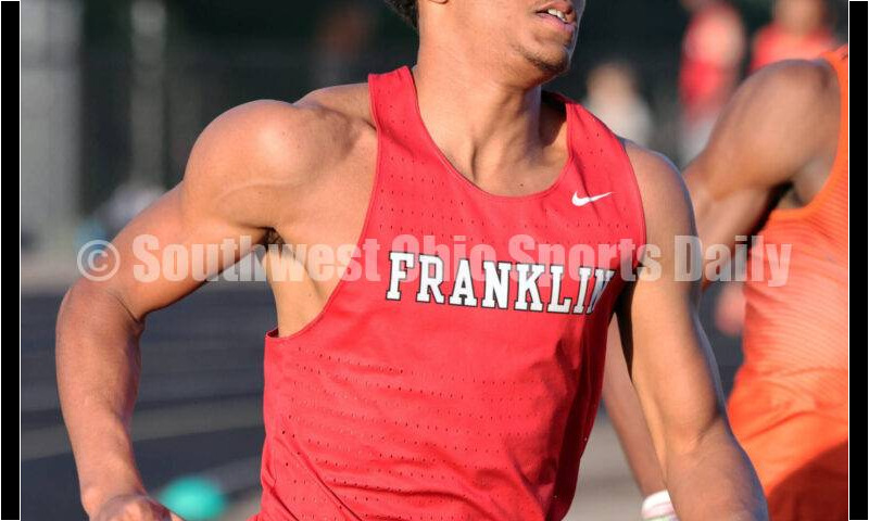 Franklin High School's Josh Carter runs in the boys 400-meter preliminary race May 15 2024, during the Division I district track & field meet at Bellbrook. RICK CASSANO/STAFF